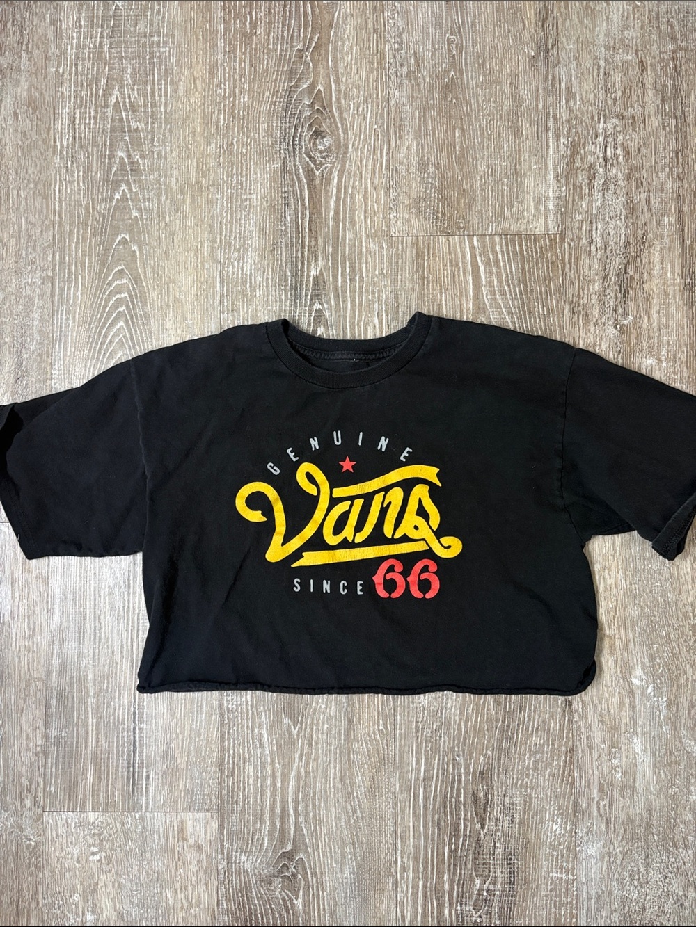 Vans Cropped Black Short Sleeve Tee with Yellow Logo and Red Accent